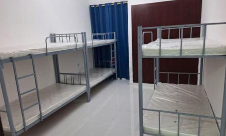 Bedspace For Male - International city phase 2 Warsan 4- sharing acomadation, free parking, Cleaning