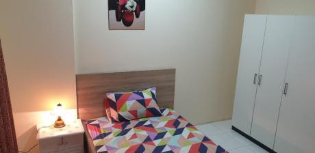 Furnished room available for executive bachelor at buhairah corniche majaz 1 and king Faysal sharjah